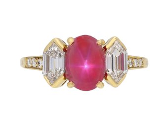Tiffany & Co. star ruby and diamond three stone ring, French, 1995.