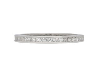 Channel set diamond eternity ring, circa 1970. 