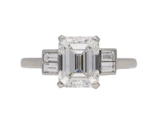 Art Deco diamond flanked solitaire ring, English, circa 1930.