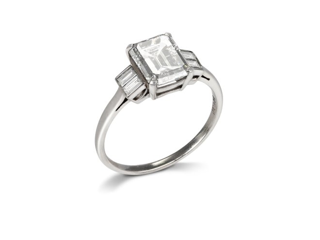 Art Deco diamond flanked solitaire ring, English, circa 1930.