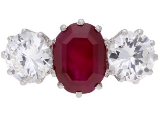 Burmese ruby and diamond three stone ring, circa 1935.