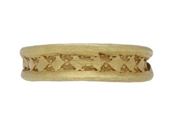 Viking stamped triangle ring in gold, circa 9th-11th century AD.