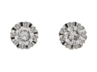 Vintage diamond stud earrings, circa 1950.