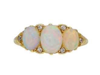 Antique opal three stone carved ring, English, circa 1900.