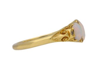 Antique opal three stone carved ring, English, circa 1900.