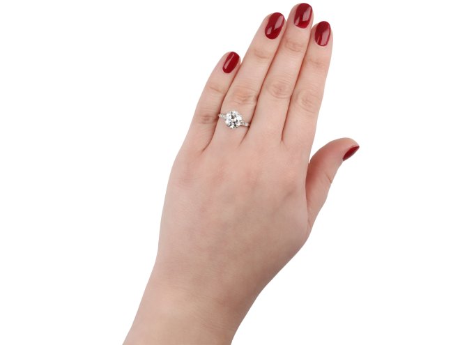 Old cut diamond flanked solitaire ring, English hatton garden