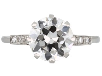 Old cut diamond flanked solitaire ring, English hatton garden