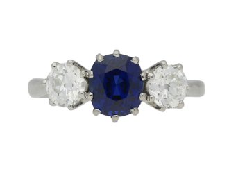 Royal Blue Burmese sapphire and diamond three stone ring, English, circa 1920.