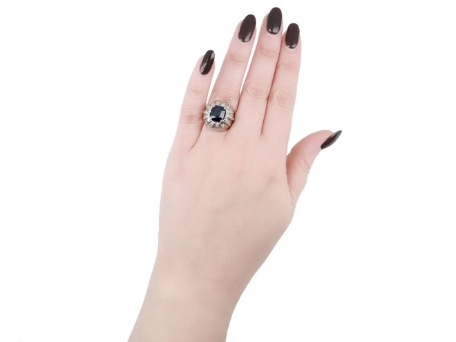 Vintage sapphire and diamond bombé cluster ring, circa 1970.