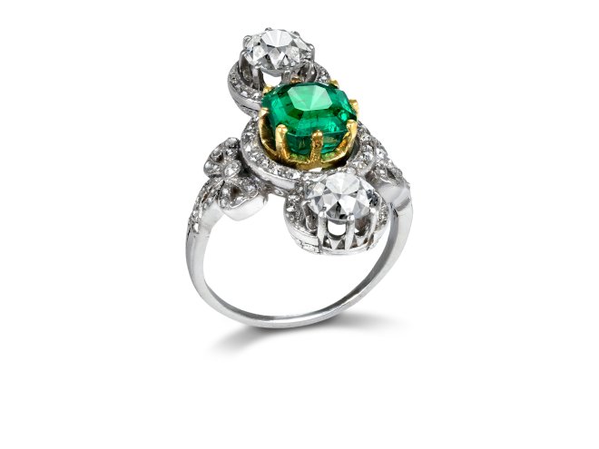 Edwardian Colombian emerald and diamond crossover ring, circa 1915.