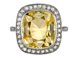 Yellow Ceylon sapphire and diamond coronet cluster ring, early 20th Century.