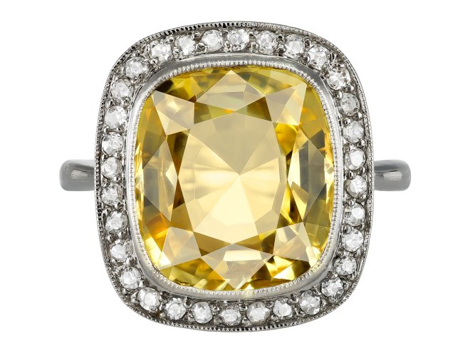 Yellow Ceylon sapphire and diamond coronet cluster ring, circa 1920. 