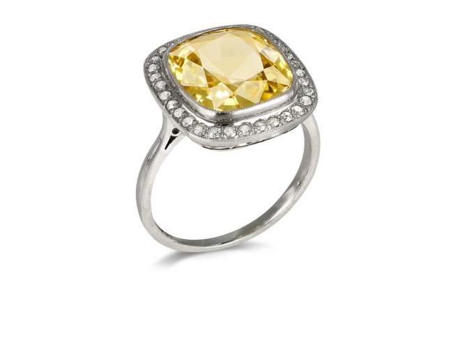 Yellow Ceylon sapphire and diamond coronet cluster ring, circa 1920. 