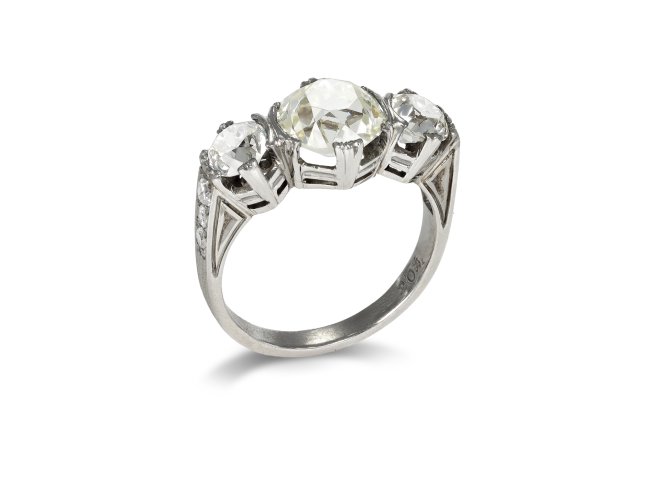 Art Deco three stone diamond ring, circa 1925. 