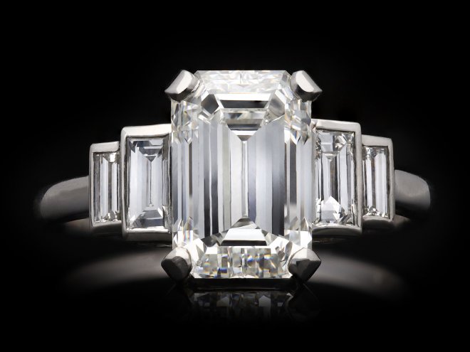 Art Deco flanked solitaire diamond ring, circa 1925. Hatton Garden