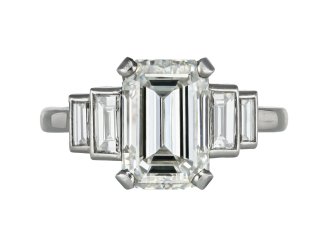 Art Deco flanked solitaire diamond ring, circa 1925.