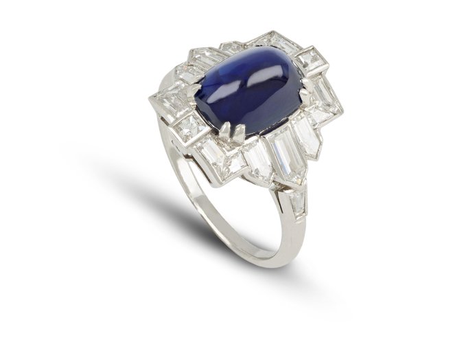 Art Deco sugarloaf cabochon sapphire and diamond ring, circa 1925. 