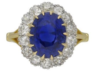 Edwardian Ceylon sapphire and diamond coronet cluster ring, English, circa 1915. 