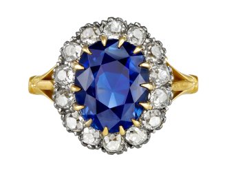 Edwardian Ceylon sapphire and diamond coronet cluster ring, English, circa 1915. 
