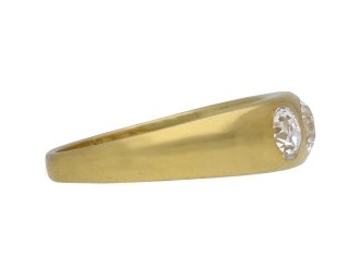 Three stone diamond gypsy ring, English, circa 1890. 