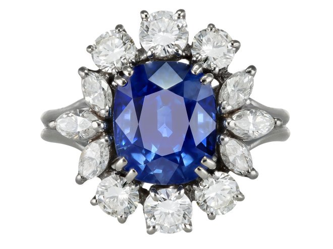 Ceylon sapphire and diamond cluster ring, circa 1950. 