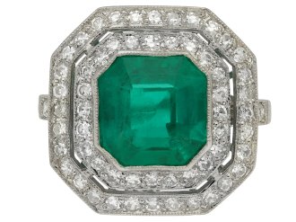 Art Deco Colombian emerald and diamond cluster ring, circa 1920.