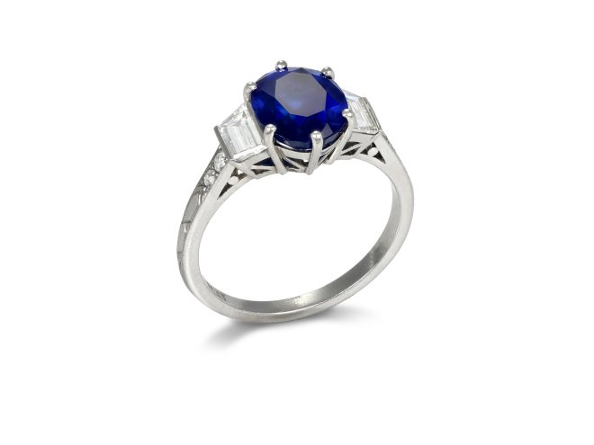 Art Deco Burmese Sapphire and Diamond flanked Solitaire Ring, circa 1930.