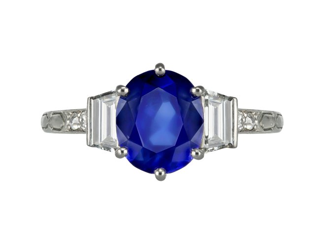 Art Deco Burmese Sapphire and Diamond flanked Solitaire Ring, circa 1930.