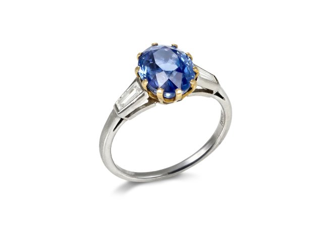 Ceylon sapphire and diamond flanked solitaire ring hatton garden