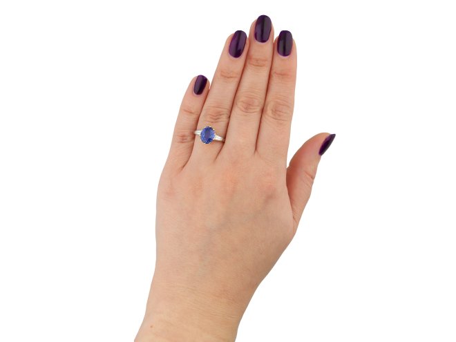 Ceylon sapphire and diamond flanked solitaire ring hatton garden