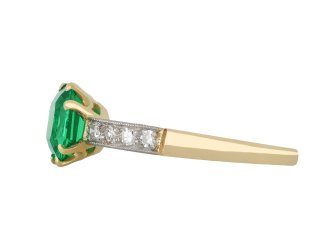 Colombian emerald diamond flanked solitaire ring hatton garden