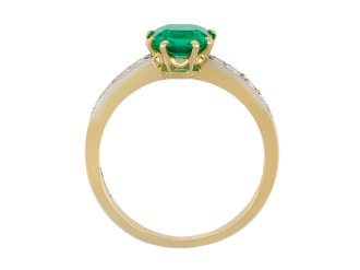 Colombian emerald diamond flanked solitaire ring hatton garden