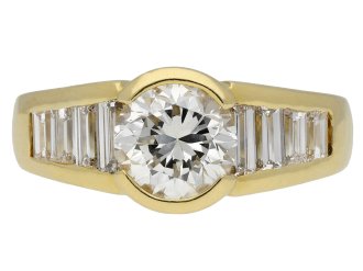 Vintage diamond flanked solitaire ring, French, circa 1970.