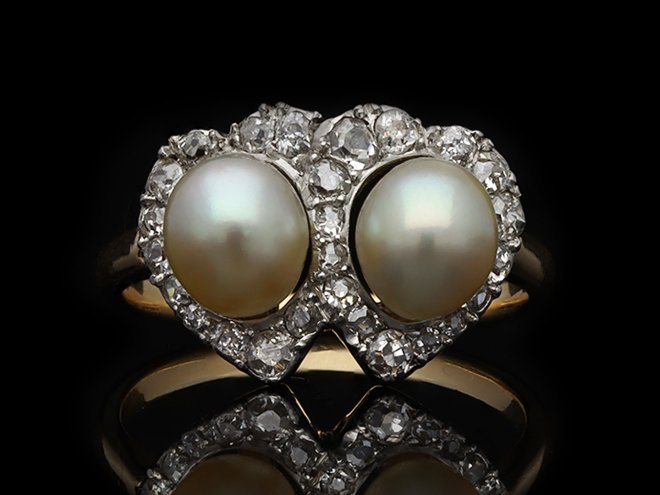 Natural pearl and diamond double heart ring, French, circa 1905. Hatton Garden