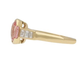 Pink Ceylon sapphire and diamond flanked solitaire ring, circa 1970. Hatton Garden