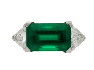 Colombian emerald diamond flanked solitaire ring hatton garden