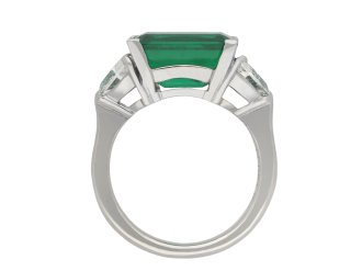 Colombian emerald diamond flanked solitaire ring hatton garden