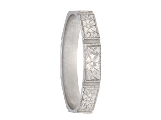 Engraved platinum wedding band, circa 1925. Hatton Garden