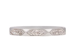 Engraved platinum wedding band, circa 1930. Hatton Garden