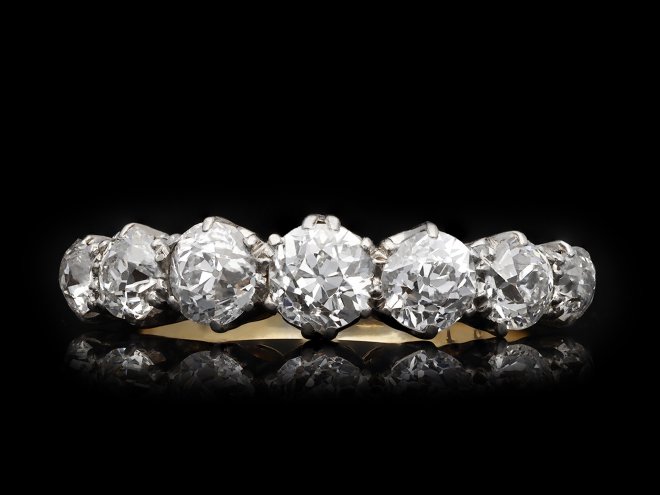 Edwardian diamond seven stone ring, English, circa 1910. Hatton Garden