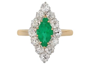 Colombian emerald and diamond cluster ring, circa 1910.
