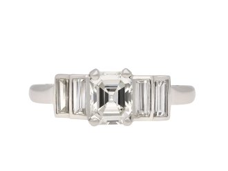 Art Deco diamond flanked solitaire ring, circa 1920. Hatton Garden