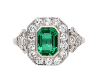 Colombian emerald and diamond coronet cluster ring, circa 1920. Hatton Garden