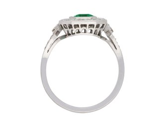Colombian emerald and diamond coronet cluster ring, circa 1920. Hatton Garden
