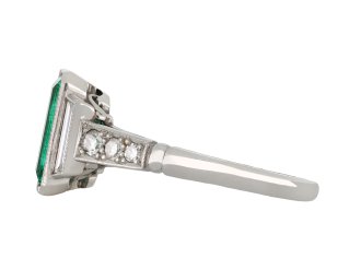 Colombian emerald diamond flanked solitaire ring hatton garden