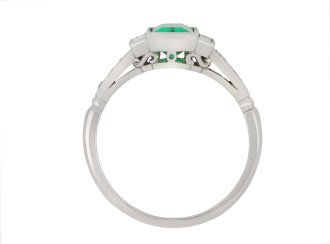 Colombian emerald diamond flanked solitaire ring hatton garden