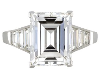 Art Deco step cut diamond flanked solitaire ring hatton garden