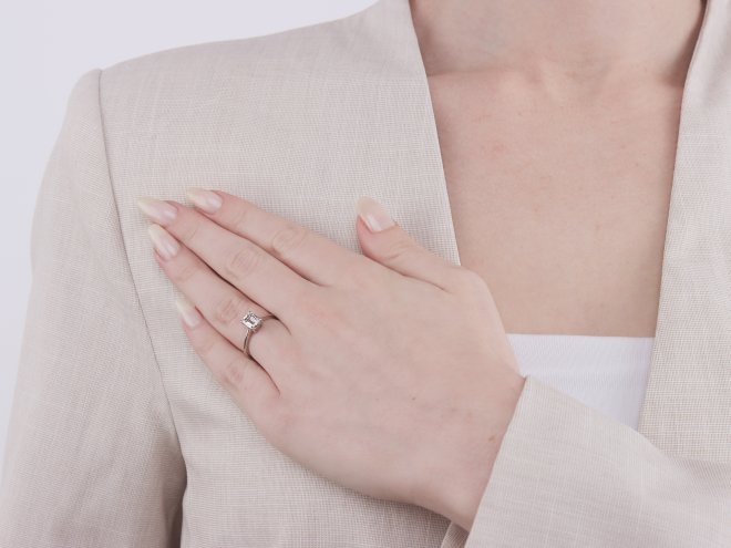 Emerald cut diamond solitaire ring, circa 1950.