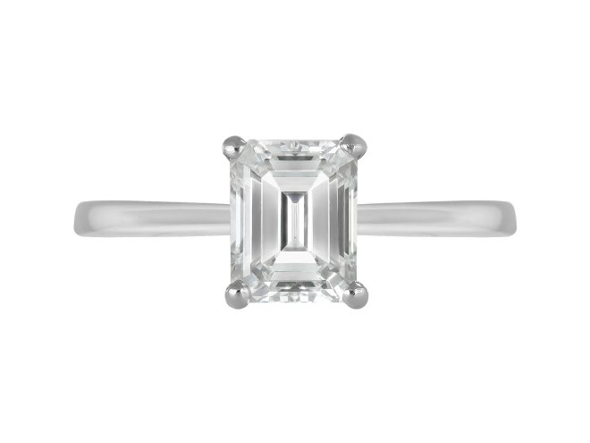 Emerald cut diamond solitaire ring, circa 1950.