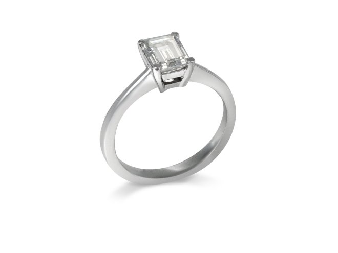 Emerald cut diamond solitaire ring, circa 1950.